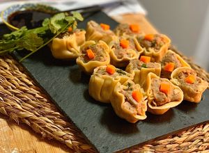 Foto principal de Dim sum de cerdo al vapor