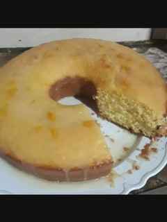 Una foto de Budín de naranja húmedo y esponjoso