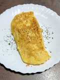 Tortilla francesa con cebolleta y queso Grana Padano