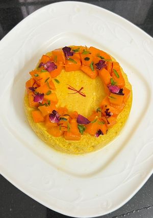 A picture of Mango Bhapa Doi Steamed Dessert.