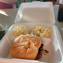 A picture of Brisket Sandwich with Super Cheesy Mac and Cheese.