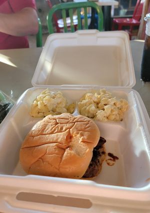 A picture of Brisket Sandwich with Super Cheesy Mac and Cheese.