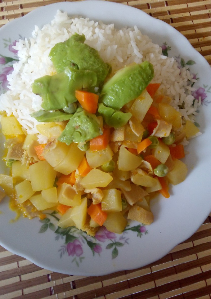 Una foto de Arroz con cau cau