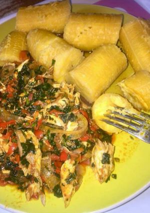 A picture of Boiled plantain with fish vegetable sauce.