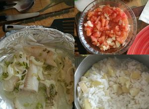 Una foto de Pescado al horno con arroz y papas cocidas y ensalada de tomate