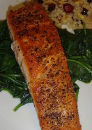 A picture of Roasted Orange Salmon with Garlicky Spinach.