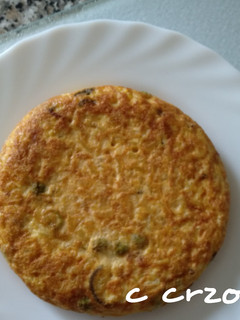 Una foto de Tortilla de paella