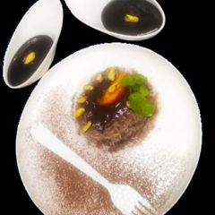 A picture of Chocolate fudge rice with peaches.