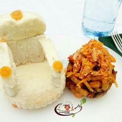 A picture of Boiled yam with carrot egg sauce.