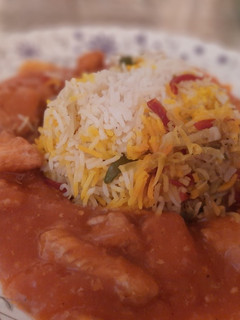 A picture of Egg fried rice with chicken manchurian.
