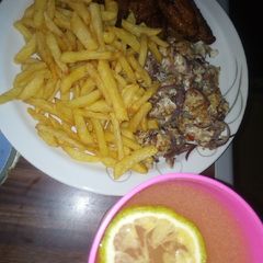 A picture of Chips/scramble egg, plantain.
