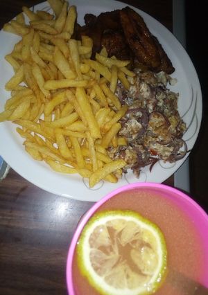 A picture of Chips/scramble egg, plantain.