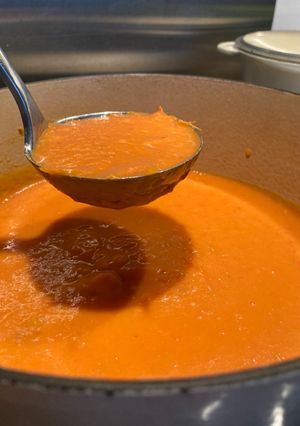 A picture of Tomato (with carrot, red pepper and potato) soup.