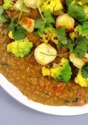 A picture of Grilled scallops /split peas dhal/ romanesco cauliflower.