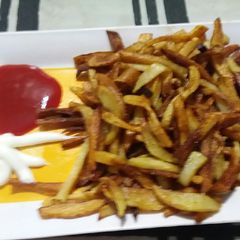 A picture of French fries with ketchup and mayonnaise.