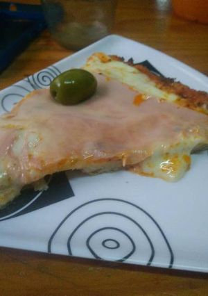 Una foto de Pizza de pan viejo