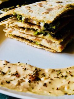 A picture of Broccoli mushroom wholewheat quesadilla.