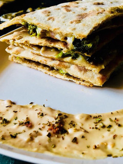 A picture of Broccoli mushroom wholewheat quesadilla.