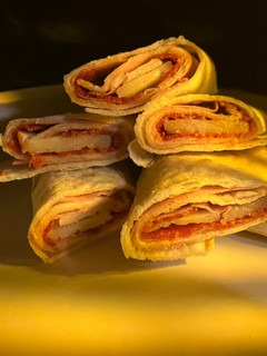 Una foto de Taco- wrap de fiambres y queso