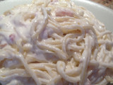 Spaghetti con queso y nata