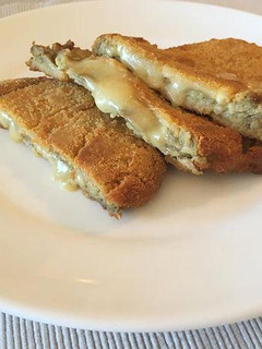 Una foto de Alberginies amb formatge havarti 🍆🧀