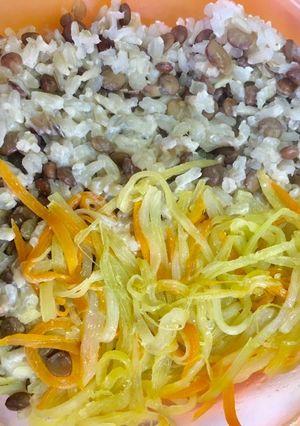 A picture of Organic rice with split peas and steamed vegs.
