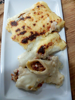 Una foto de Canelones Gratinados