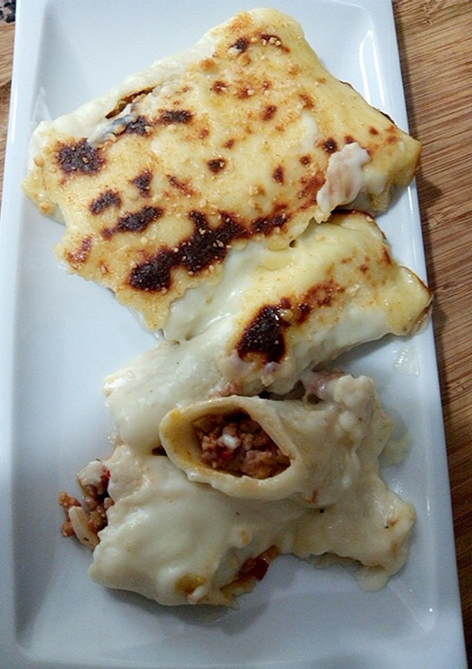 Una foto de Canelones Gratinados