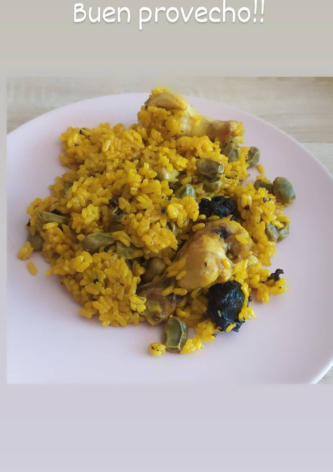 Una foto de Arroz con pollo y habas