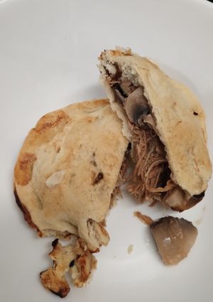 A picture of Slow cooked pulled chicken and mushroom mini pies. gluten free with walnuts.