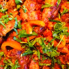 A picture of Roast chicken with chunky pepper.