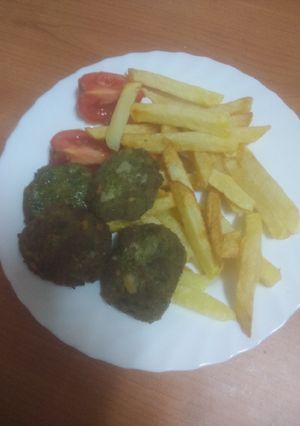 Una foto de Mini filetes rusos de merluza, espinacas y nueces