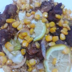 A picture of Chicken suya salad.