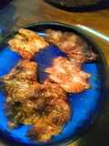 Asado a la parrilla de manta chancho y mollejas al ají (picante)