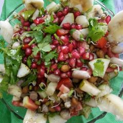 A picture of Sprouts and fruirs salad.