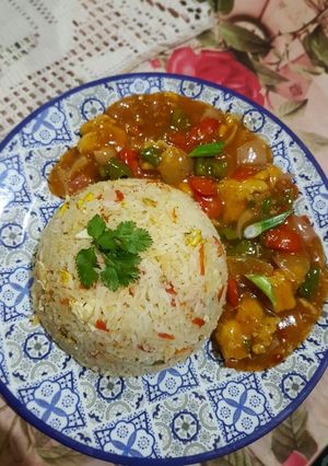 A picture of Egg Fried Rice and Chicken Manchurian.