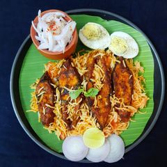 A picture of Katla fish biryani in electric rice cooker.