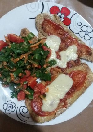 Una foto de Berenjena napolitana con Ensalada
