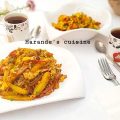 A picture of Veggies and sausage fried Irish potato.