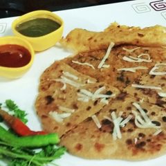 A picture of Tuver Dal Split Pigeon Peas Spicy Parathas.