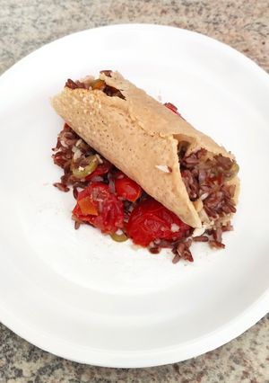 Foto di Cannolo di cialda di parmigiano con riso alla platessa