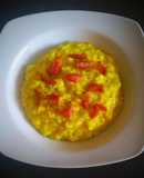 Risotto con curcuma cavolfiore gorgonzola e guanciale tostato