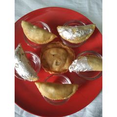 A picture of Sweet Potato Ghujiya.
