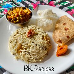 A picture of Sprout Pulao with Gobi Matar Curry.