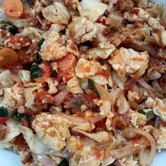 A picture of Egg & meat floss with veggies stir fry.