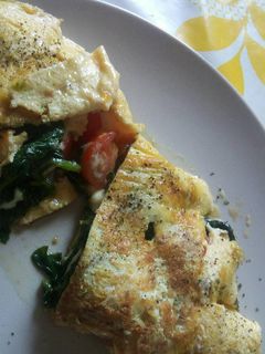 Una foto de Tortilla francesa rellena de espinacas