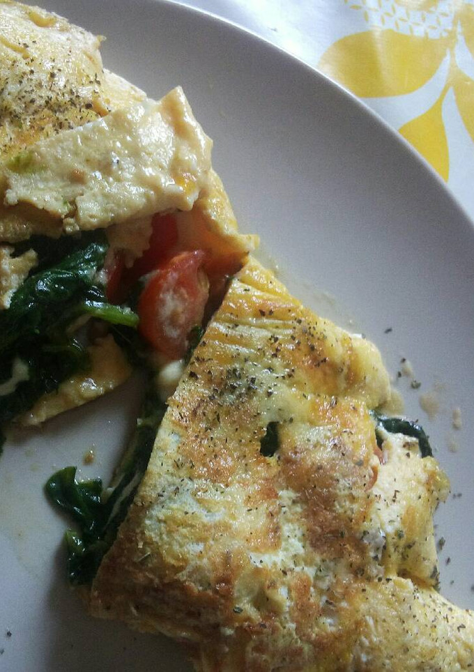 Una foto de Tortilla francesa rellena de espinacas