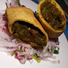 A picture of Makki saag spring roll.