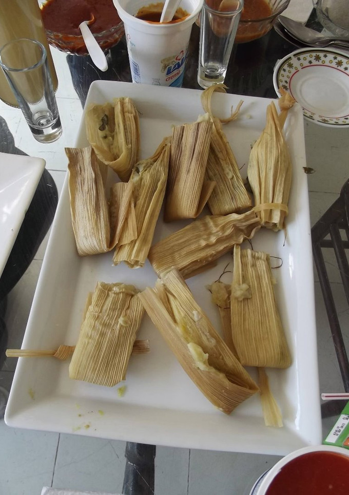 Una foto de Tamales de hongos
