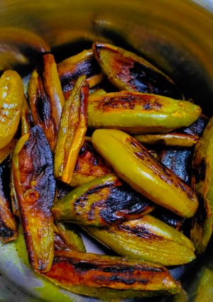 A picture of Potol Bhaja: Fried Pointed Gourd.